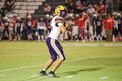 Columbia quarterback Bronsen Tillotson drops back to pass against Wakulla last Friday. (BRENT KUYKENDALL/Lake City Reporter)