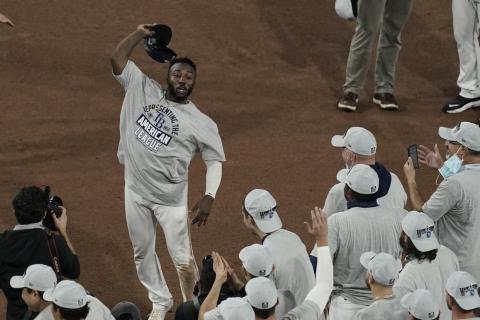 Tampa Bay Rays left fielder Randy Arozarena celebrates his MVP award following their victory against the Houston Astros in Game 7 of the American League Championship Series on Saturday in San Diego. The Rays defeated the Astros 4-2 to win the series 4-3 games. (JAE C. HONG/Associated Press)