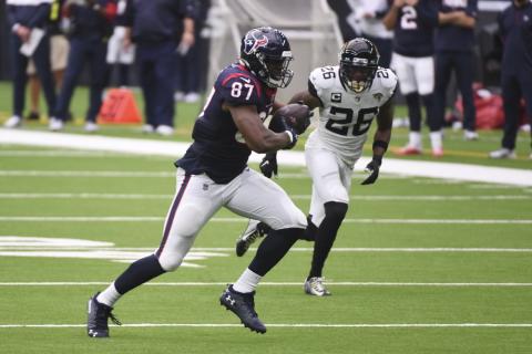 Houston Texans wide receiver Brandin Cooks (13) makes a catch against the Jacksonville Jaguars on Sunday in Houston. (MICHAEL WYKE/Associated Press)