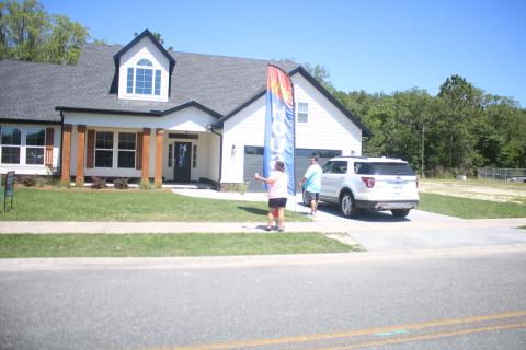 People arrive to look at a house on last year’s Parade of Homes. (FILE)