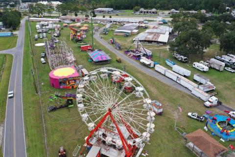 Rides on the midway at the Florida Gateway Fairgrounds were set up and assembled Tuesday prior to this weekend’s start of the 66th annual Florida Gateway Fair. (RAY CARPENTER PHOTOGRAPHY)