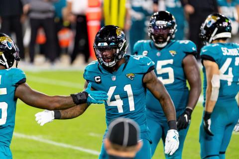 Jacksonville Jaguars defensive end Josh Allen celebrates a sack on Miami Dolphins quarterback Ryan Fitzpatrick at TIAA Bank Field on Sept. 24 in Jacksonville. (TRIBUNE NEWS SERVICE)