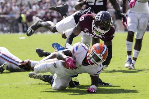 Florida wide receiver Kadarius Toney (1) is stopped just short of the goal line by Texas A&M defensive back Myles Jones (0) during the second quarter on Saturday in College Station, Texas. (SAM CRAFT/Associated Press)