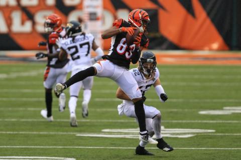 Cincinnati Bengals wide receiver Tyler Boyd (83) makes a catch in front of Jacksonville Jaguars free safety Andrew Wingard (42) on Sunday, in Cincinnati. (AARON DOSTER/Associated Press)