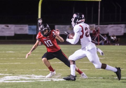 Fort White defensive back Sydney Parrish moves on for a tackle against Baldwin on Friday night. (CHRISTINA FEAGIN/Special to the Reporter)