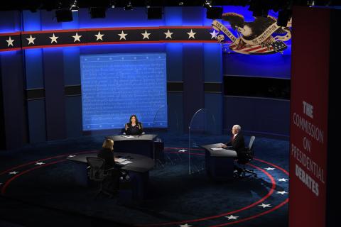 The candidates debate on stage during the Vice Presidential debate between Republican nominee Vice President Mike Pence and Democratic nominee Sen. Kamala Harris held at Kingsbury Hall at The University of Utah. Susan Page, Washington Bureau Chief for USA Today, is the moderator. (JACK GRUBER/USA Today Pool Photo)