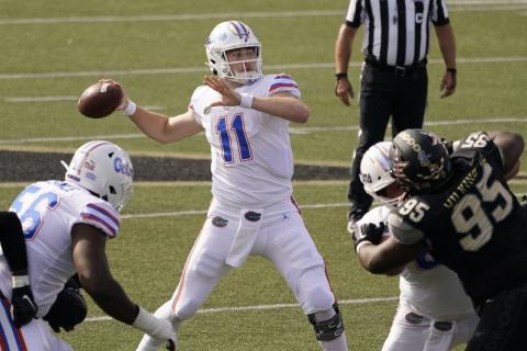 Florida quarterback Kyle Trask (11) passes against Vanderbilt on Saturday in Nashville, Tenn. (MARK HUMPHREY/Associated Press)