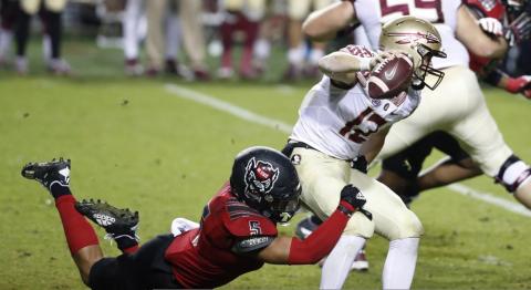 North Carolina State linebacker C.J. Hart Jr. (5) sacks Florida State quarterback Chubba Purdy (12) on Nov. 14 in Raleigh, N.C. (ETHAN HYMAN/The News & Observer via AP, Pool)