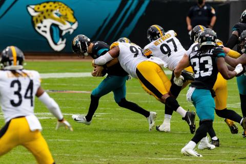 Jacksonville Jaguars quarterback Jake Luton (6) is sacked by Pittsburgh Steelers defensive end Stephon Tuitt (91) during Sunday's game at TIAA Bank Field in Jacksonville. (MATT PENDLETON/TNS)