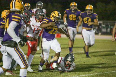 Columbia running back Tony Fulton escapes a tackle against Seabreeze during Friday’s Region 1-6A quarterfinal. (BRENT KUYKENDALL/Lake City Reporter)