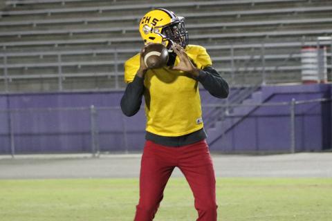 Columbia quarterback Marcus Peterson drops back to pass during Tuesday’s practice. (JORDAN KROEGER/Lake City Reporter)