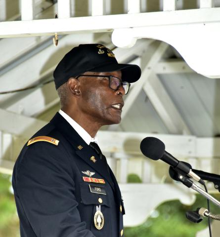 Robert Ford, who spent 26 years in the U.S. Army, said the ending of the pledge of allegiance is a promise that will guide the nation to ‘real liberty and justice for all’ during the Veterans Day ceremony. (ROB WOLFE/Special to the Reporter)