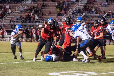 Fort White quarterback Tyler Jefferson scrambles for yardage against Taylor County on Oct. 2. (CHRISTINA FEAGIN/Special to the Reporter)