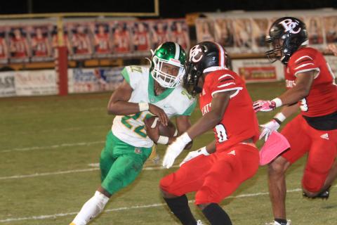 Suwannee running back Malachi Graham takes a carry up the field against Baker County last Friday. (PAUL BUCHANAN/Special to the Reporter)