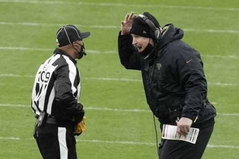 Jacksonville Jaguars head coach Doug Marrone argues a call with side judge Dyrol Prioleau (109) during the second half of Sunday's game against the Green Bay Packers on Sunday in Green Bay, Wis. The Packers won 24-20. (MARRY GASH/Associated Press)