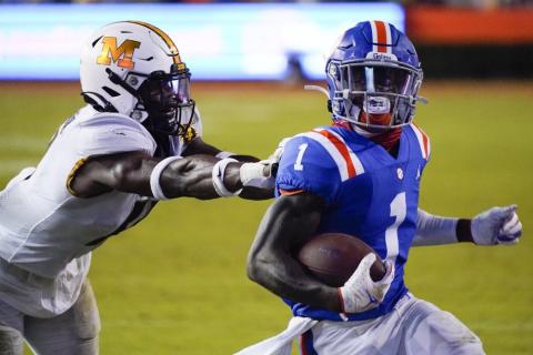 Florida wide receiver Kadarius Toney (1) runs for a 16-yard touchdown as he gets past Missouri linebacker Devin Nicholson on Satuirday in Gainesville. (JOHN RAOUX/Associated Press)