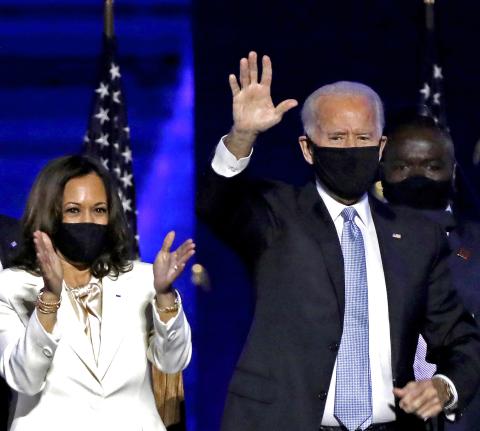 Vice-President-elect Kamala Harris and President-elect Joe Biden celebrate with supporters after declaring victory in the presidential election at the Chase Center in Wilmington, Delaware, on Saturday. (CAROLYN COLE/Los Angeles Times/TNS)