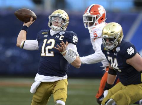 Notre Dame quarterback Ian Book throws a pass against Clemson during the Atlantic Coast Conference championship on Saturday in Charlotte, N.C. (JEFF SINER/The News & Observer via AP)