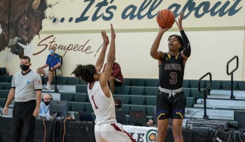 Columbia guard Charleston Ponds lets a shot fly against West Nassau in the fifth-place game at the Battle at The Villages on Wednesday. (COURTESY)