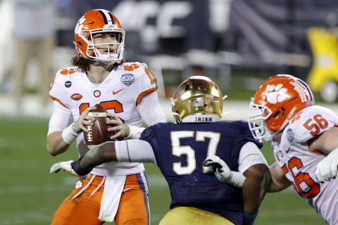 Clemson quarterback Trevor Lawrence, looking to pass in the fourth quarter against Notre Dame during the ACC championship game at Bank of America Stadium on Saturday in Charlotte, North Carolina. Lawrence is the presumed top pick in the 2021 NFL draft, which currently belongs to Jacksonville. (JARED C. TILTON/Getty Images/TNS)