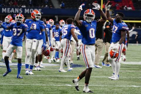 Florida players celebrate a Florida running back Nay'Quan Wright (6) touchdown against Alabama during the second half of the Southeastern Conference championship on Saturday in Atlanta. (BRYNN ANDERSON/Associated Press)