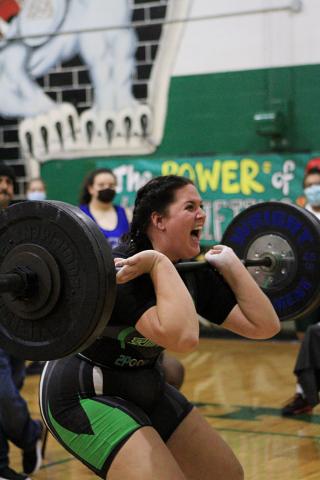Suwannee’s Samantha Barber pumps herself up during a lift Friday at the Power of Christmas Invitational at SHS. Barber finished fourth in the unlimited division. (PAUL BUCHANAN/Special to the Reporter)