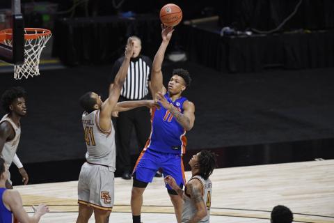 Florida's Keyontae Johnson shoots over Boston College's Steffon Mitchell (41) on Thursday in Uncasville, Conn. (JESSICA HILL/Associated Press)