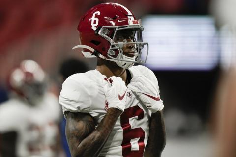 Alabama wide receiver DeVonta Smith (6) warms up before the Southeastern Conference championship game against Florida on Dec. 19 in Atlanta. Heisman Trophy finalists Mac Jones and DeVonta Smith have been selected to The Associated Press All-America team, Monday, Dec. 28, 2020, leading a contingent of five Alabama players on the first-team offense. (BRYNN ANDERSON/Associated Press)