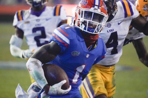 Florida wide receiver Kadarius Toney (1) scores a touchdown against LSU on Saturday in Gainesville. (JOHN RAOUX/Associated Press)