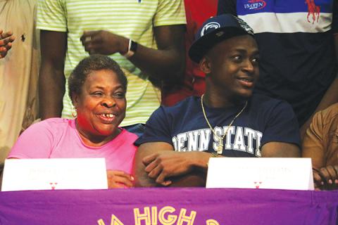 Columbia receiver TJ Jones is pictured with his grandmother Barbara Jernigan after signing his National Letter of Intent with Penn State on Wednesday. (ERIC JACKSON/Lake City Reporter)