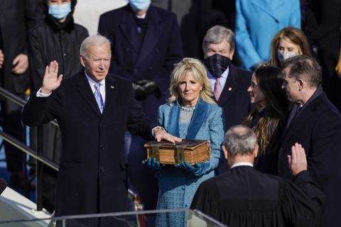 U.S. President-elect Joe Biden takes the oath of office from Supreme Court Chief Justice John Roberts as his wife U.S. First Lady-elect Jill Biden stands next to him during the 59th presidential inauguration on Wednesday in Washington, D.C. (KENT NISHIMURA/Los Angeles Times/TNS)