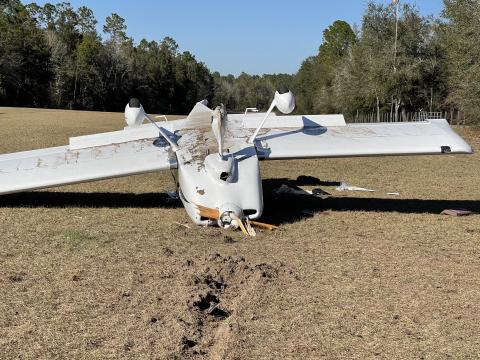 A small airplane flipped over on a grass airstrip in O’Brien on Friday afternoon after its front wheel broke after landing. (COURTESY SUWANNEE COUNTY SHERIFF'S OFFICE)
