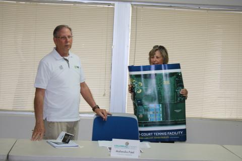 Mike Null and Dolly Robinson from the Lake City Columbia County Tennis Association speak during a presentation Wednesday afternoon at the Columbia County Tourist Development Council meeting. (TONY BRITT/Lake City Reporter)