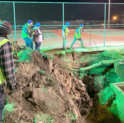 Lake City utility crews worked late into the night Tuesday fixing a water main break at Columbia High School. (COURTESY)