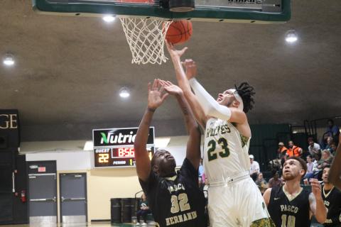 Florida Gateway College forward Brandon Farmer rises to score against Pasco-Hernando State College during last season’s Division II Region 8 Championship. (JORDAN KROEGER/Lake City Reporter)