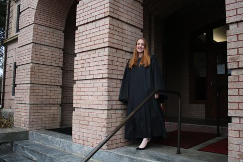 Sara Carter, stands on the steps of the Columbia County Courthouse on Friday afternoon. Carter, 42, has been serving as the Columbia County Court judge for roughly two weeks. (TONY BRITT/Lake City Reporter)