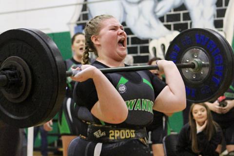 Suwannee lifter Autum Latreille performs the clean and jerk during Friday’s District 4-1A meet. Latreille was one of nine SHS lifters to win weight classes as the Lady Bulldogs won their third straight district title. (PAUL BUCHANAN/Special to the Reporter)