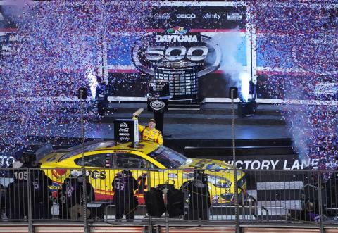 Michael McDowell celebrates in Victory Lane early Monday morning after winning the Daytona 500. (NIGEL COOK/News-Journal/TNS)