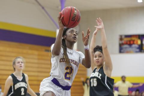 Columbia guard Na’Haviya Paxton rises to score against Buchholz in the District 2-6A championship on Feb. 5. The Lady Tigers lost to Navarre 71-49 on the road in the Region 1-6A quarterfinals on Thursday night. (BRENT KUYKENDALL/Lake City Reporter)