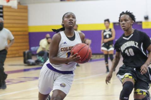 Columbia guard Anzarria Jerkins goes up for a shot against Buchholz during the District 2-6A championship game on Feb. 5. (BRENT KUYKENDALL/Lake City Reporter)