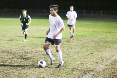 Columbia’s Marcos Medina-Rodriguez looks to pass during the District 2-6A championship against Lincoln on Feb. 8. (BRENT KUYKENDALL/Lake City Reporter)