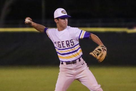 Columbia shortstop Mason Gray fires to first base against Ocala Forest last season. (FILE)