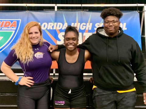 Columbia lifters Reece Chasteen (from left), Da'Niya Lewis and Trachelle Williams at the Class 2A state meet on Saturday at Suwannee. (COURTESY)