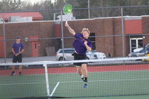 Columbia’s Camrin Wilcoxon returns a shot against Union County on Thursday. (JORDAN KROEGER/Lake City Reporter)