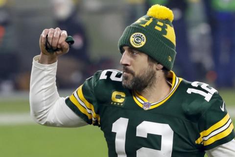 Green Bay Packers quarterback Aaron Rodgers pumps his fist after an NFL divisional playoff game against the Los Angeles Rams on Jan. 16 in Green Bay, Wis. (MIKE ROEMER/Associated Press)