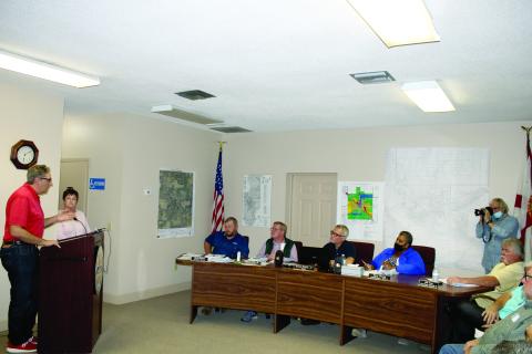 Lake City Councilman Todd Sampson talks to the Fort White Town Council about the city providing utility services to Fort White at a meeting Monday. (TONY BRITT/Lake City Reporter)