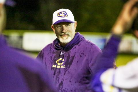 Columbia coach Brian Thomas smiles after receiving an ice-water bath from his team following the Tigers’ 13-1 win over Bradford on Wednesday night, which gave Thomas 300 victories in his career. (BRENT KUYKENDALL/Lake City Reporter)