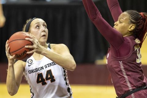 Oregon State's Taylor Jones (44) looks toward the basket over Florida State forward Valencia Myers (32) during the first round of the women's NCAA Tournament at the University Events Center on Sunday in San Marcos, Texas. (STEPHEN SPILLMAN/Associated Press)