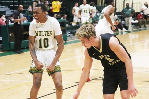 FGC forward D’Andre Jefferson yells in celebration after a dunk against Pasco-Hernando State College on Tuesday night. (JORDAN KROEGER/Lake City Reporter)