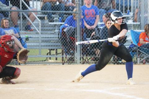 Branford’s Cera McElreath eyes a pitch against Columbia on Tuesday night. (MORGAN MCMULLEN/Lake City Reporter)